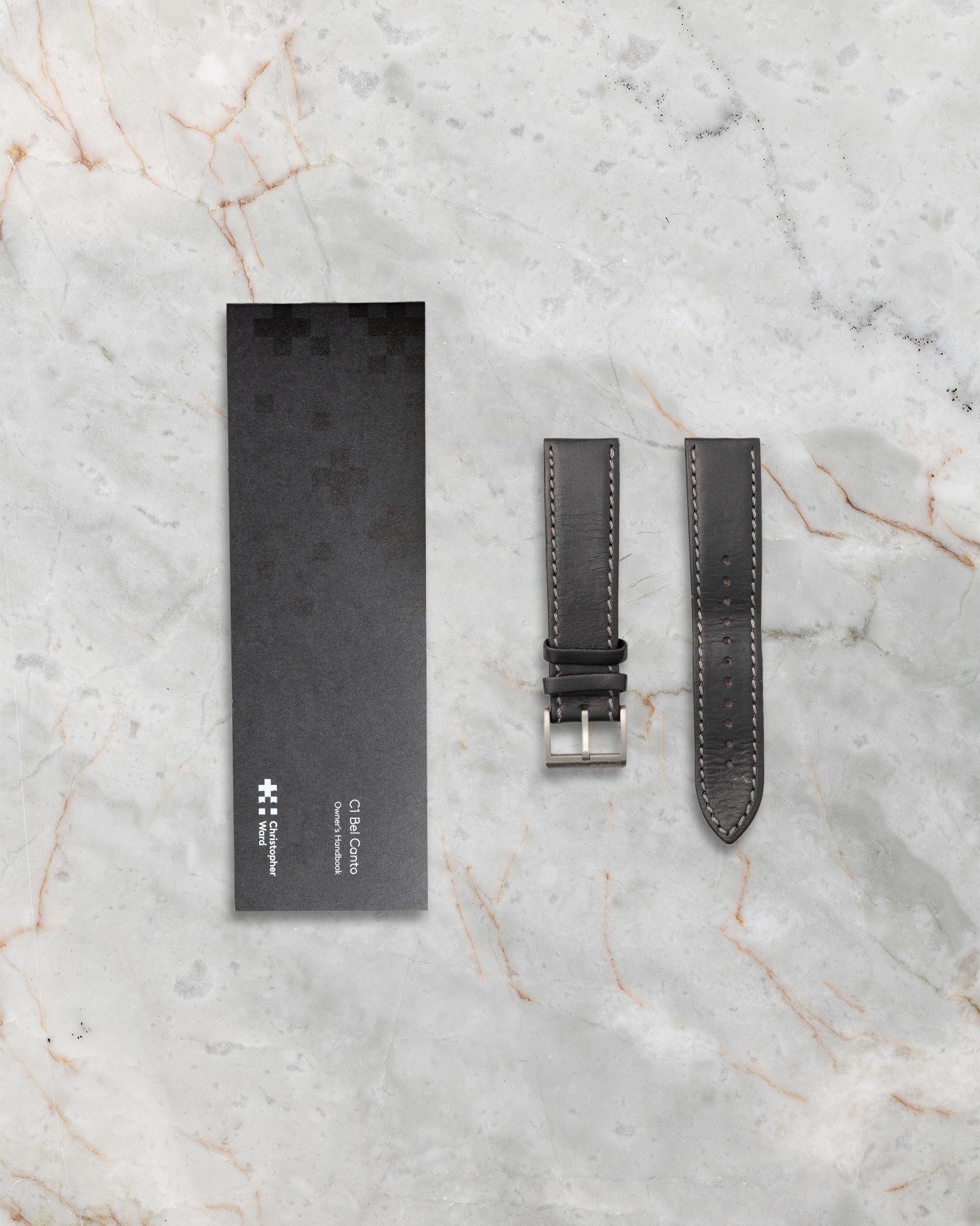Extra black leather strap and accessory sleeve included with Christopher Ward C1 Bel Canto Nero watch set