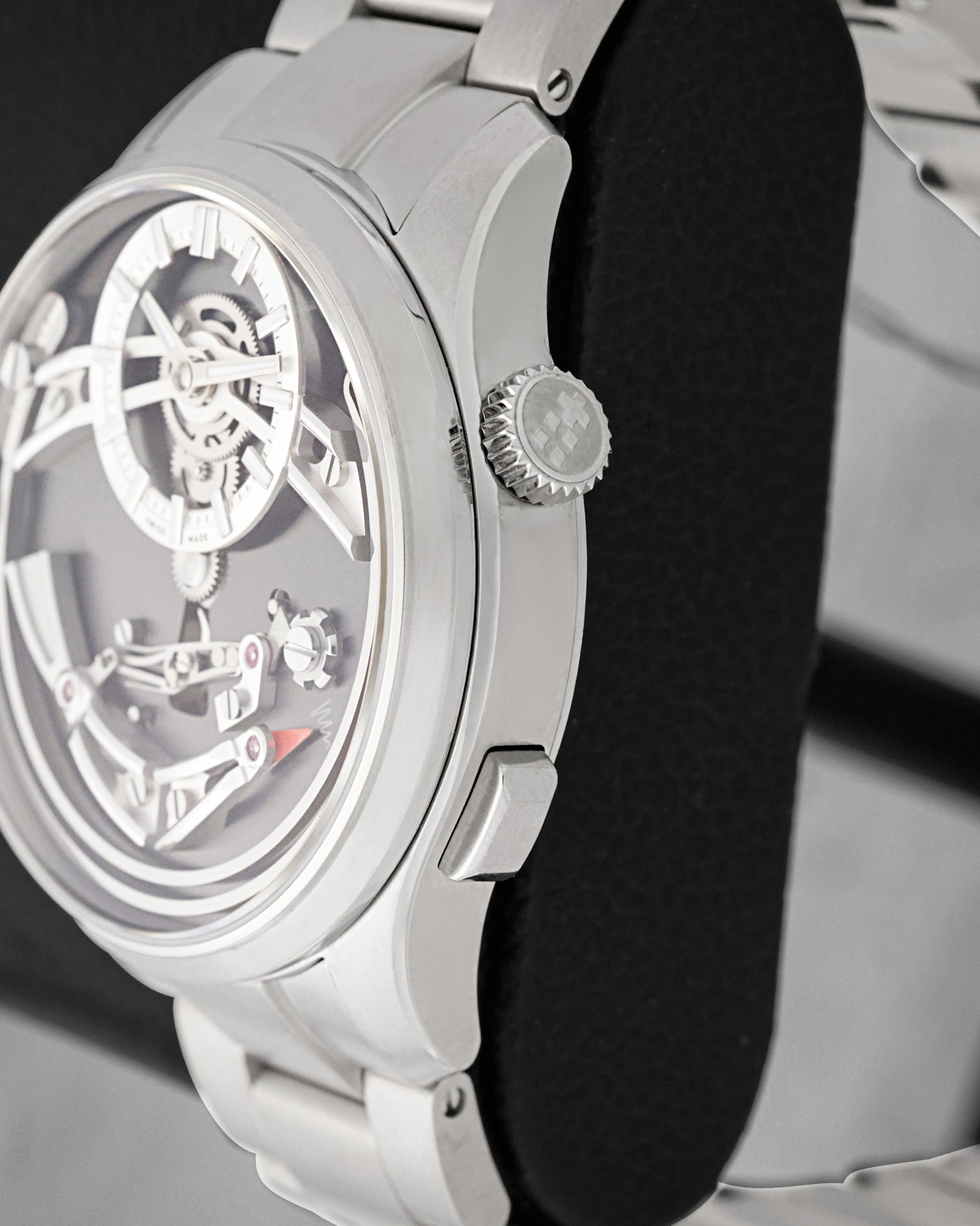 Side profile close-up of Christopher Ward C1 Bel Canto showing the titanium Light-catcher case, crown, and chime activation pusher