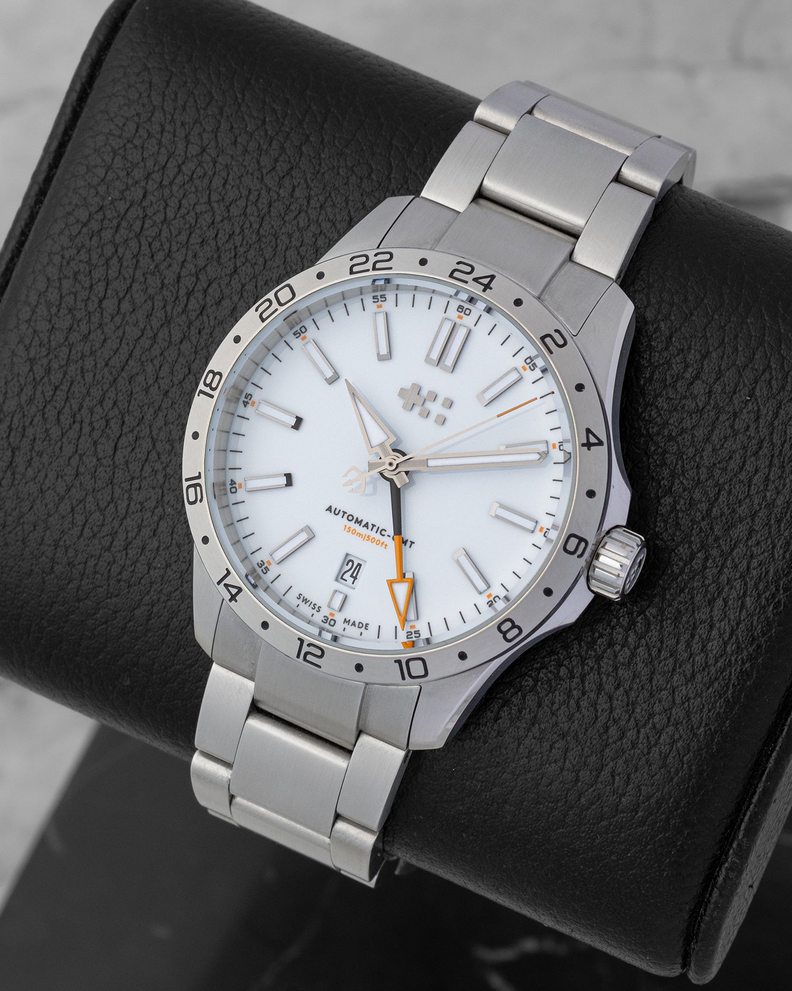 Front angled view of a 2025 Christopher Ward C63 Sealander GMT white dial automatic watch at Noah's Fine Watches in Dallas