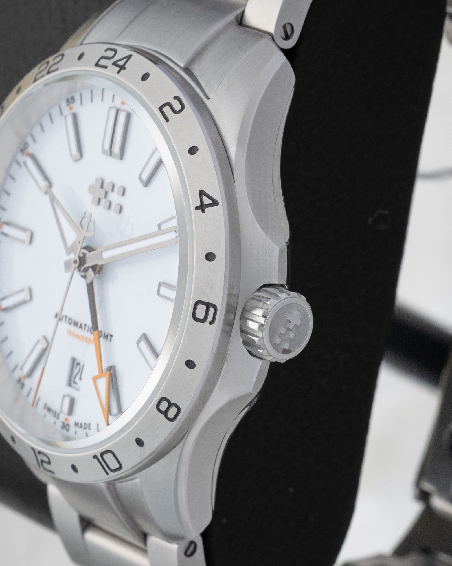 Side profile view showcasing the crown and steel case finish of the Christopher Ward C63 Sealander GMT