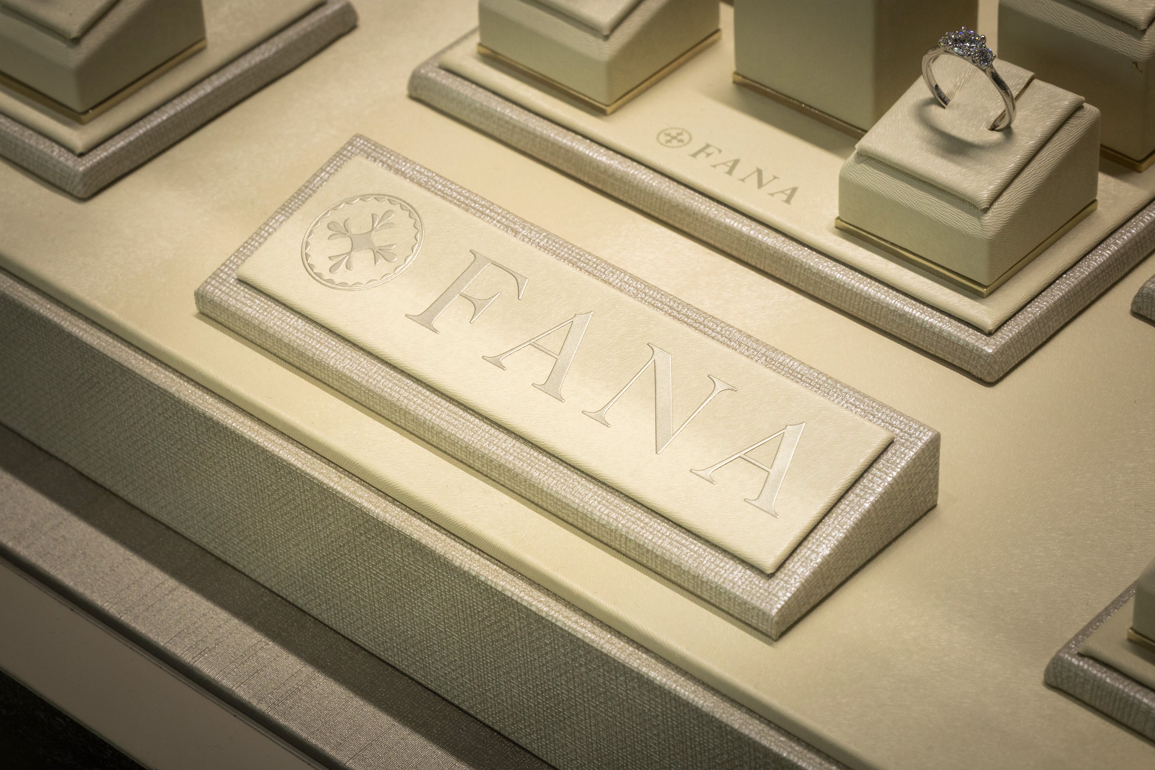 Official FANA fine jewelry branded plaque on display at Noah's Fine Jewelry and Watches in Dallas
