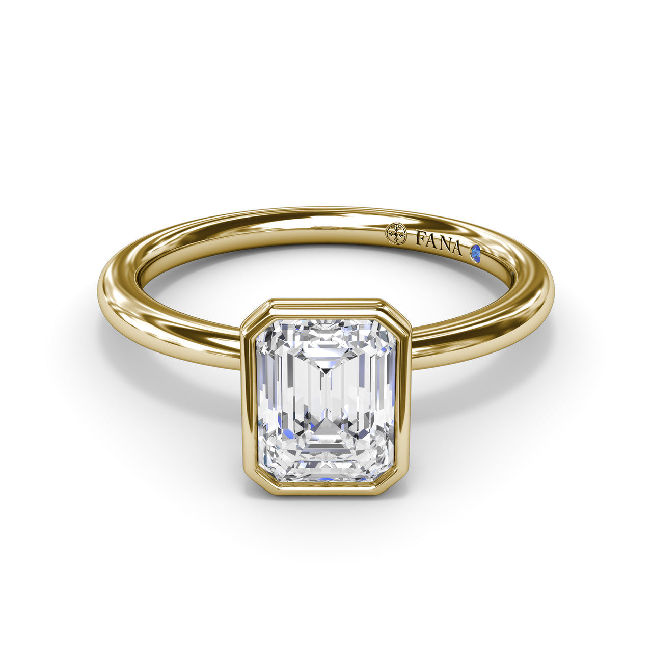 Front-facing studio view of the Fana S4067 emerald cut engagement ring emphasizing the step-cut facets and structural yellow gold bezel border