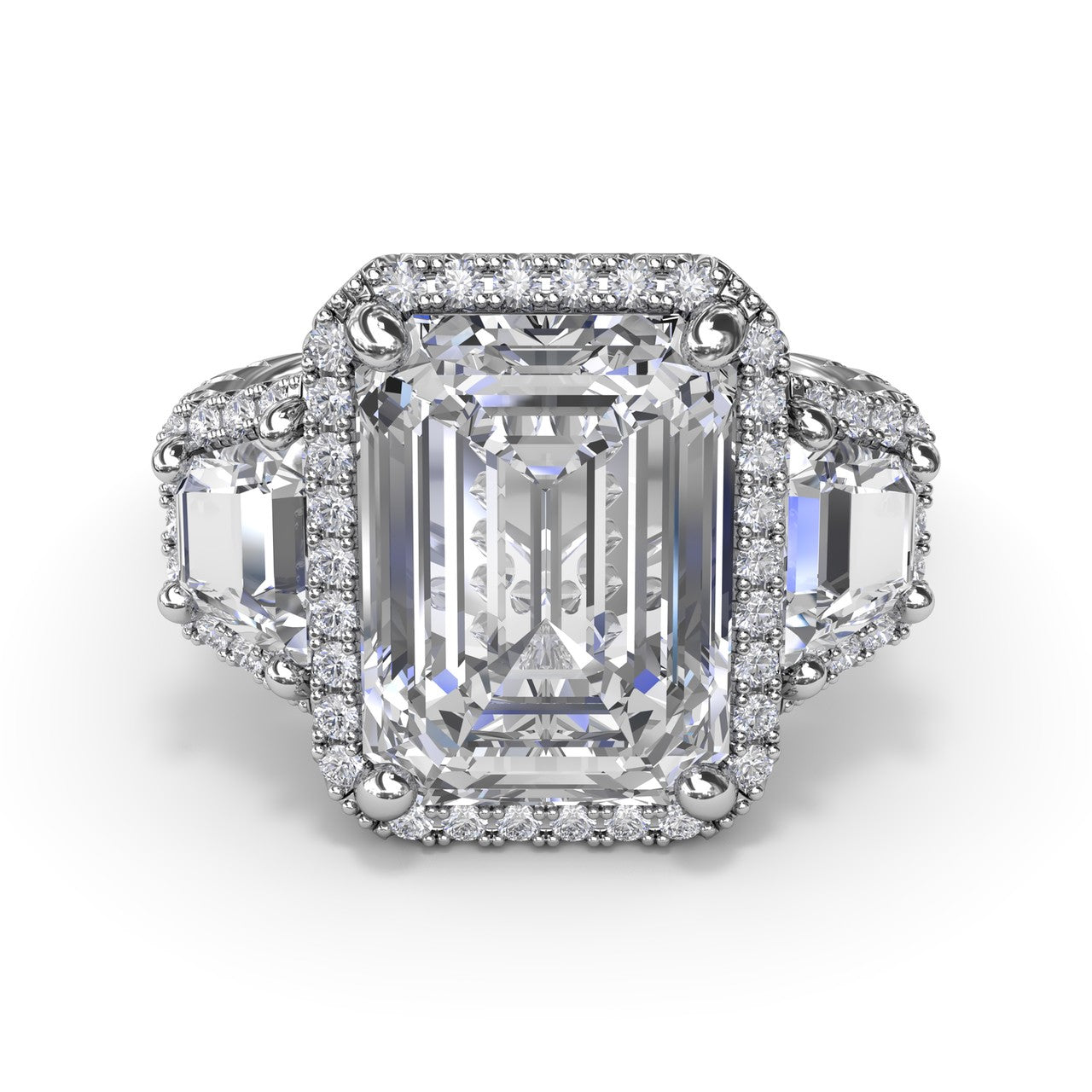 Studio front-facing view of the Fana S4280 ring highlighting the seamless geometric flow between the emerald cut center halo and step-cut trapezoid side diamonds