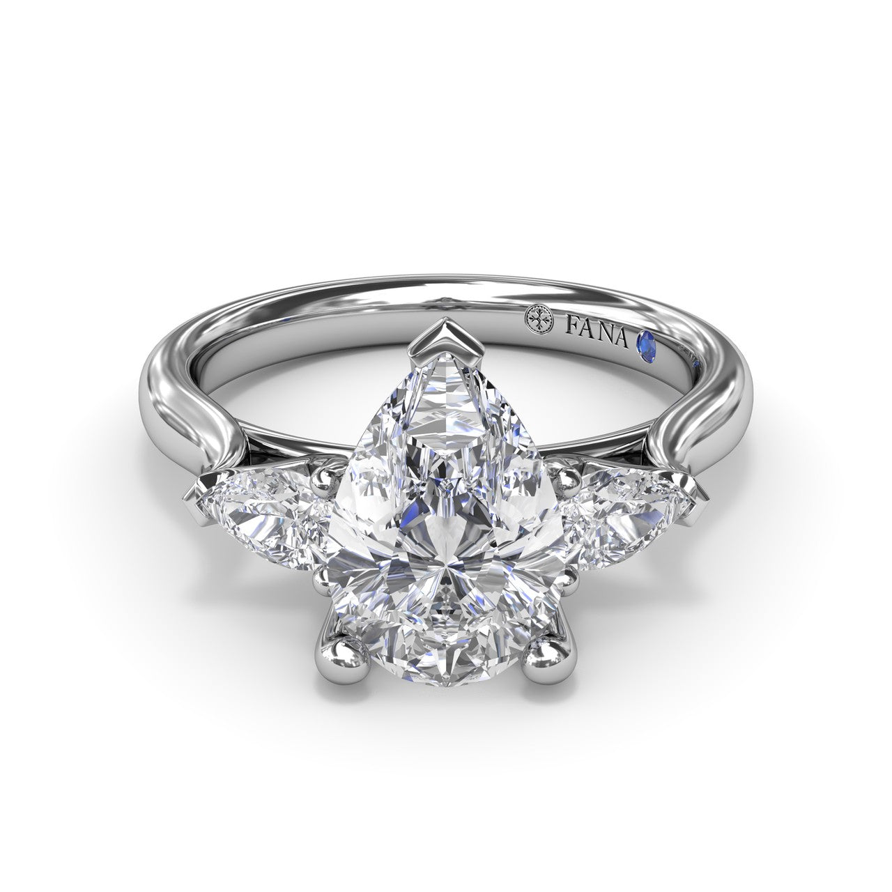 Studio front view of the Fana S4340 three stone ring, highlighting the uniform flow of the pear-shaped center and side diamonds