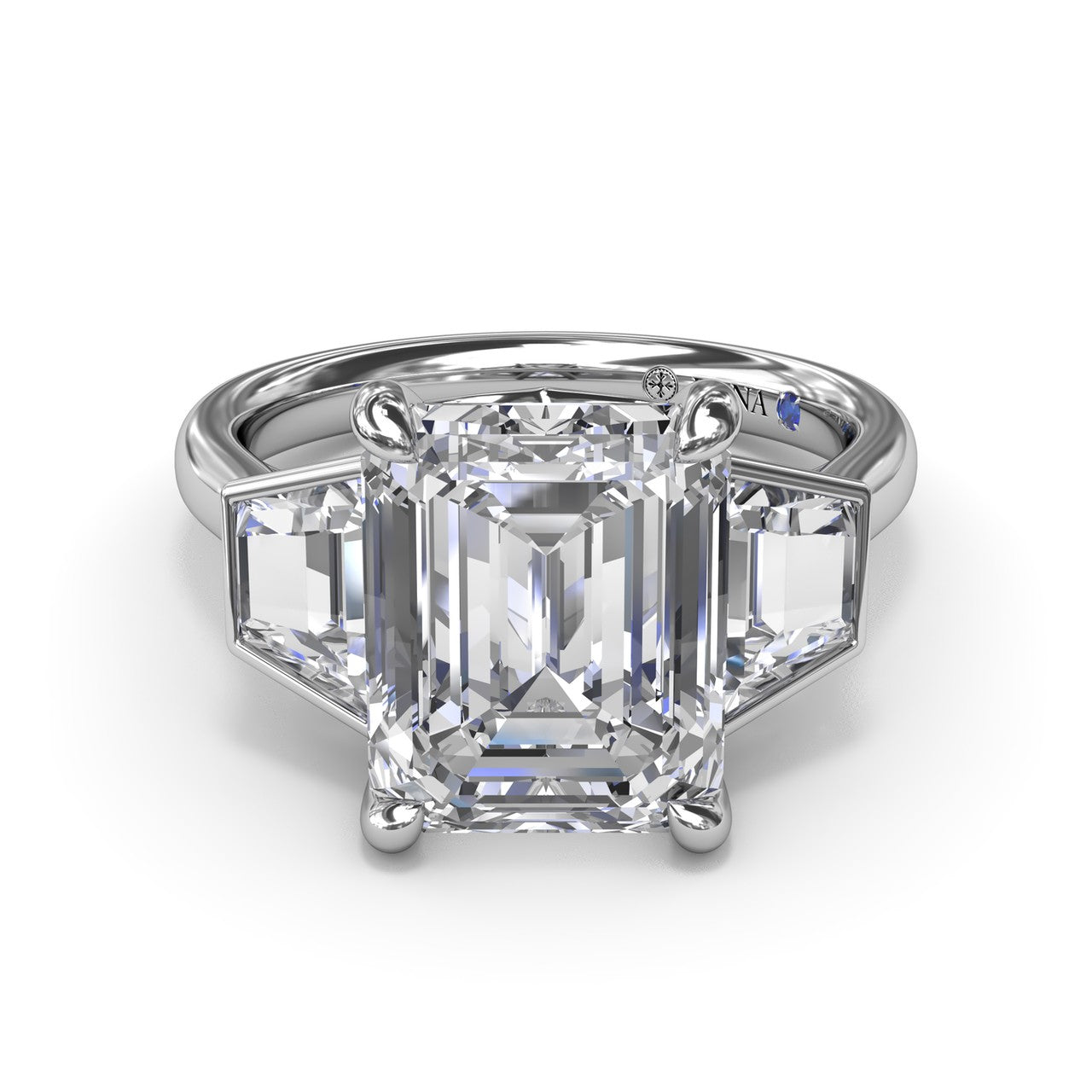 Studio front view of the Fana S4376 three stone ring, highlighting the geometric flow between the emerald cut center stone and trapezoid diamond accents