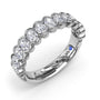 Angled side-view profile of the Fana W4379 white gold bezel diamond band highlighting the polished metal borders and open under-gallery settings