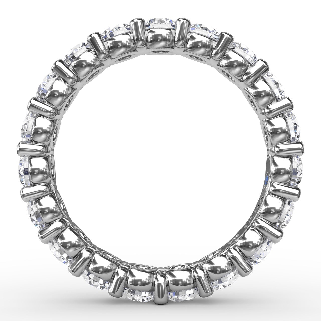 Circular interior profile view of the Fana W6129 white gold eternity band, highlighting the heavy shared-prong alignment and open scalloped light gallery