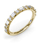 Angled side-view profile of the Fana W7493 14k yellow gold wedding ring displaying the secure setting geometry and stone clarity