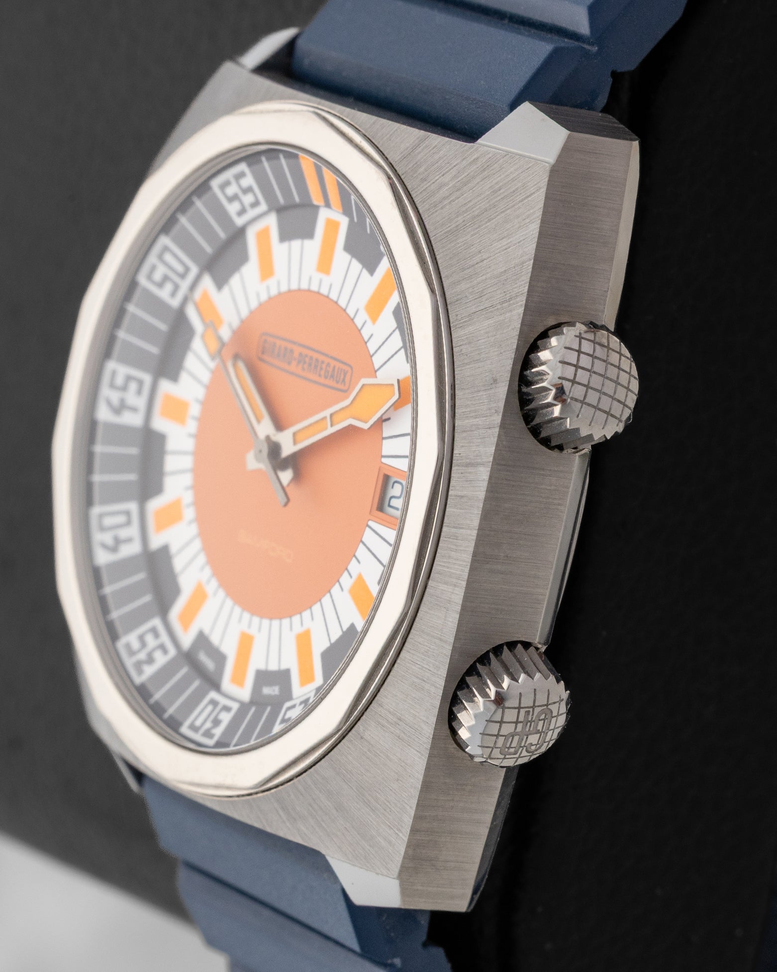 Side profile view showing the twin fluted crowns and titanium case of the Girard-Perregaux x Bamford Deep Diver Legacy Edition