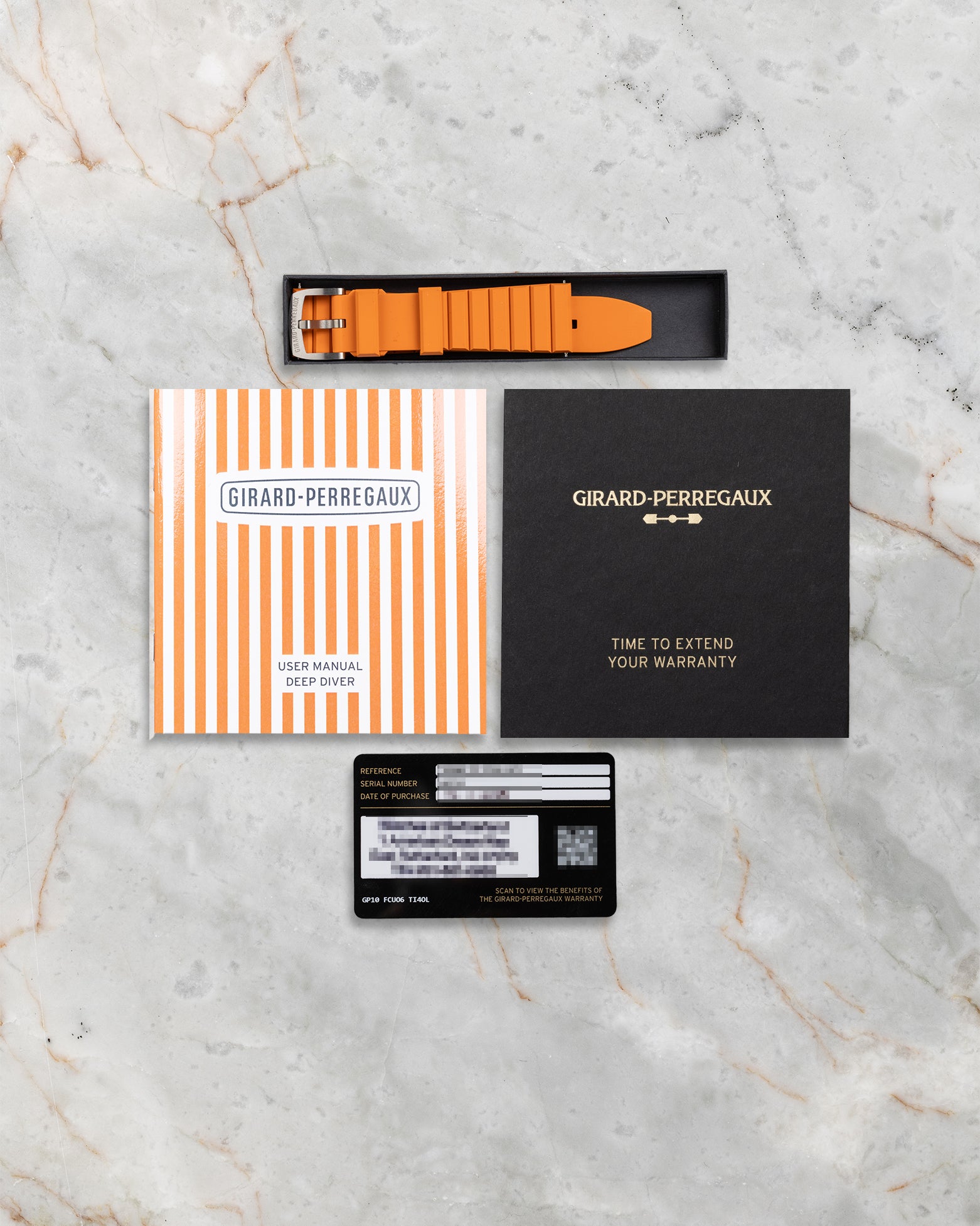 Complete accessory set including additional orange rubber strap, instruction booklet, and warranty card for GP Deep Diver 39500-21-3266-6CX