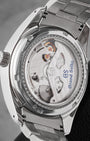 The reverse profile view through a sapphire exhibition caseback revealing the innovative Grand Seiko Caliber 9R65 Spring Drive movement adorned with linear Tokyo stripes