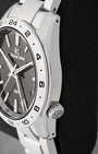 Side profile view showing the comfortable 4 o'clock screw-down crown and Zaratsu-polished stainless steel case of Grand Seiko SBGN027G