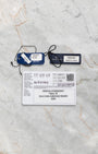 Original Grand Seiko international warranty card and factory serial hangtags included with pre-owned SBGN027G