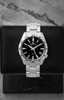 Preowned 2025 Grand Seiko Sport Collection GMT SBGN027G 39mm stainless steel watch with black sunray dial at Noah's Fine Watches & Jewelry in Dallas, Texas.