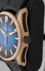 close-up side profile view of the H. Moser Pioneer case highlighting the architectural black DLC-coated titanium side inserts and crown