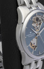 Side view of the polished stainless steel bezel and lugs on a Hamilton Jazzmaster automatic watch