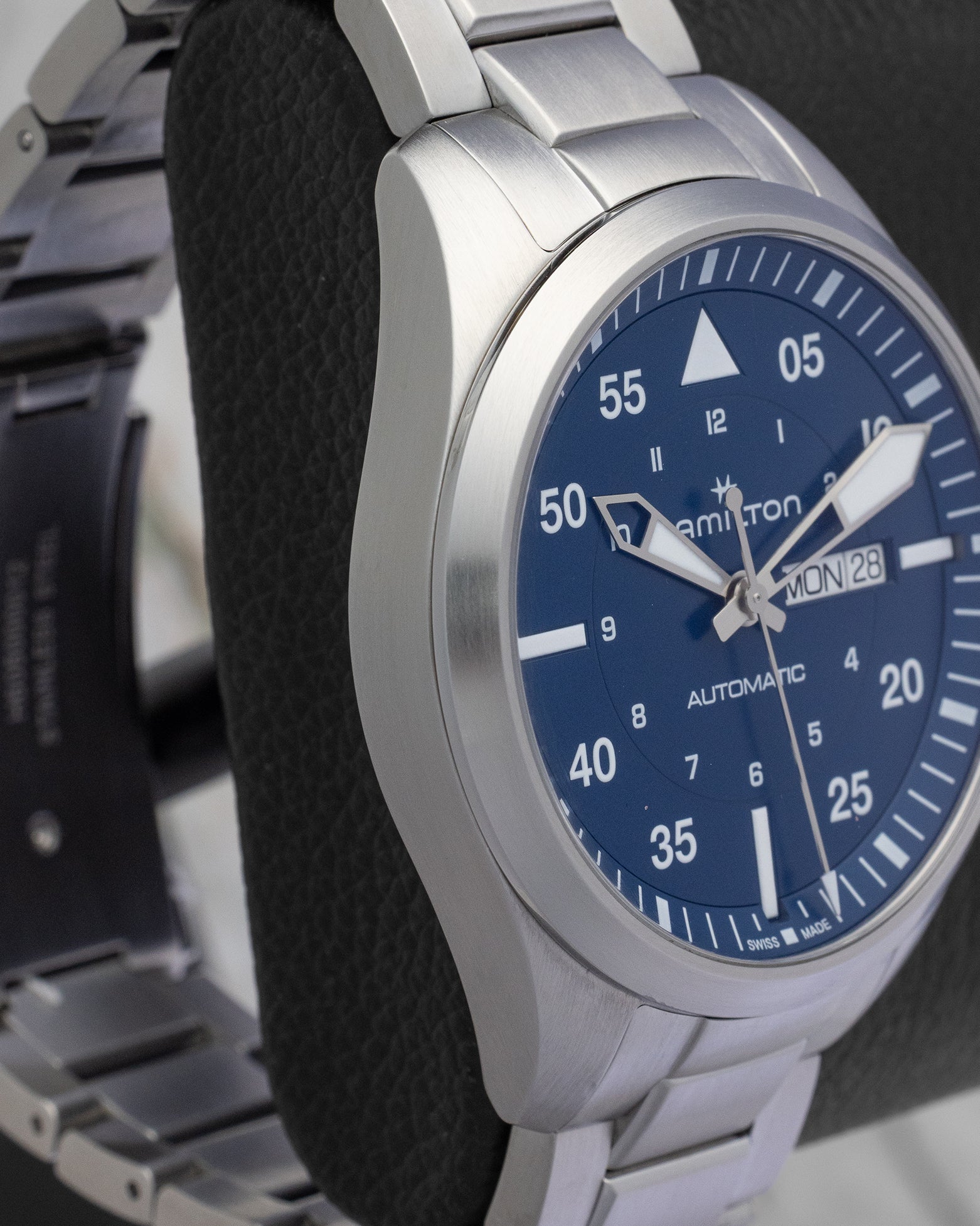 Side profile view of the steel watch case with polished bezel accents on a 42mm Hamilton pilot watch
