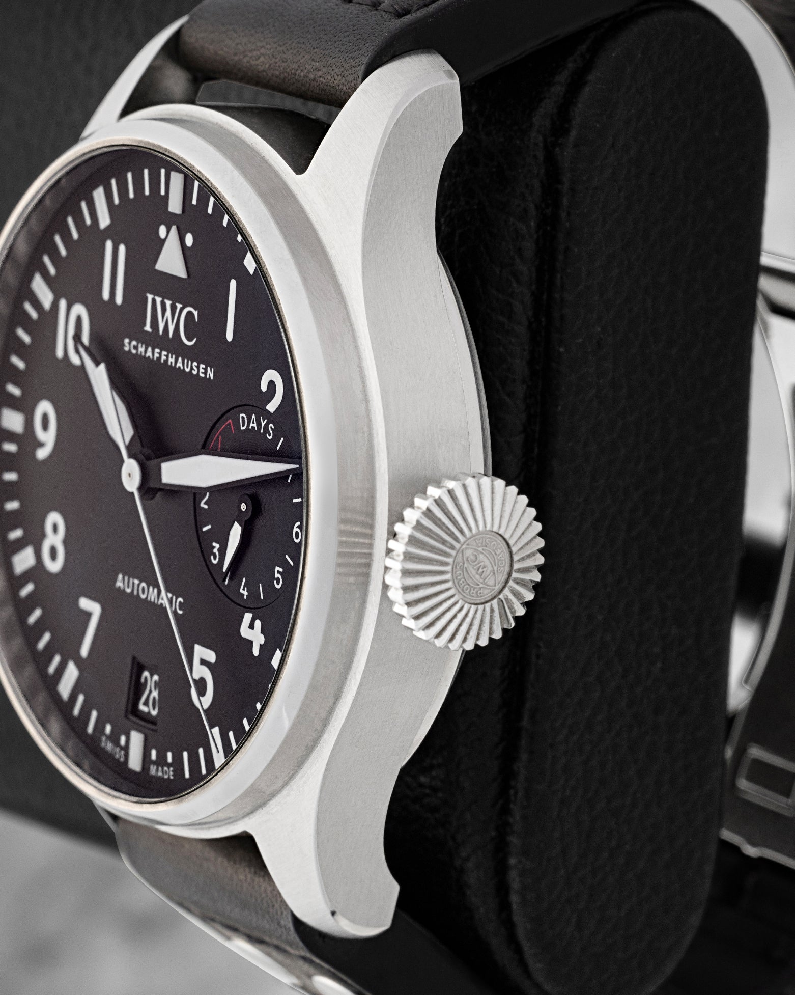 Side profile view showing the iconic oversized conical screw-in crown and stainless steel case of IWC Big Pilot's Watch IW501001