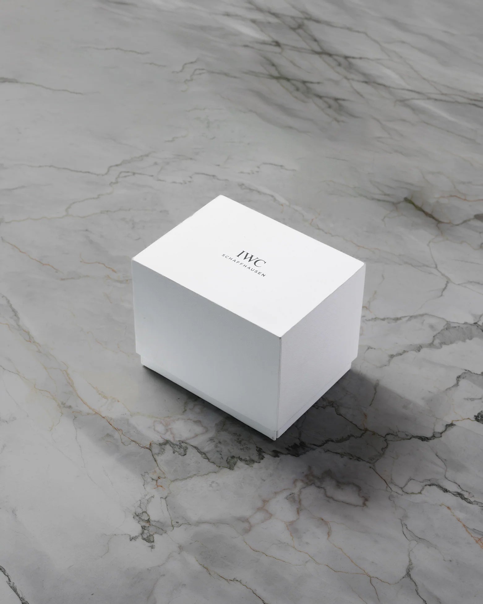 Official white outer presentation box for pre-owned IWC Big Pilot's Watch IW501001 at Noah's Fine Watches & Jewelry in Dallas
