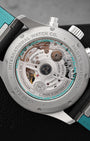 Sapphire glass case back revealing the IWC-manufactured 69385 calibre movement with Petronas green details