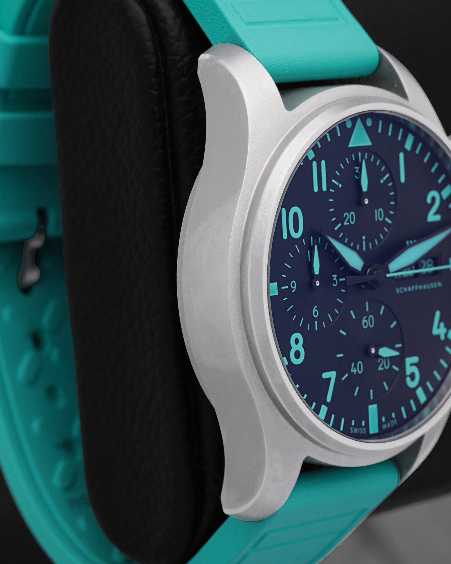 Side profile view of the polished and brushed titanium case on the non-crown side of an IWC Pilot's Chronograph 41