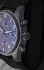 Side profile shot focusing on the patented Ceratanium case finish, screw-down winding crown, and tactile chronograph pushers on the IWC Pilot 41