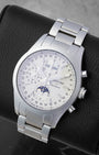 Longines Conquest Classic Moonphase watch with a silver vertical tapestry dial multi-display chronograph subdials and a gold-accented moonphase window