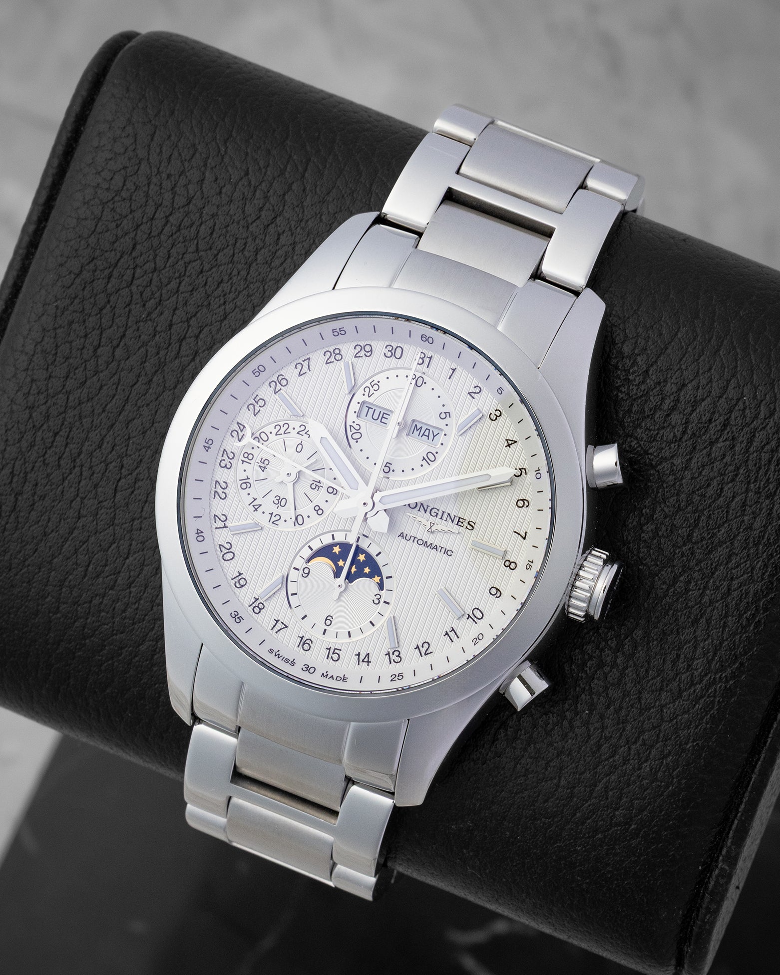 Longines Conquest Classic Moonphase watch with a silver vertical tapestry dial multi-display chronograph subdials and a gold-accented moonphase window