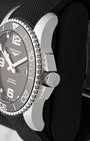 Side profile view showing the protective crown guards, screw-down winding crown, and stainless steel case on Longines HydroConquest L3.781.4.56.9
