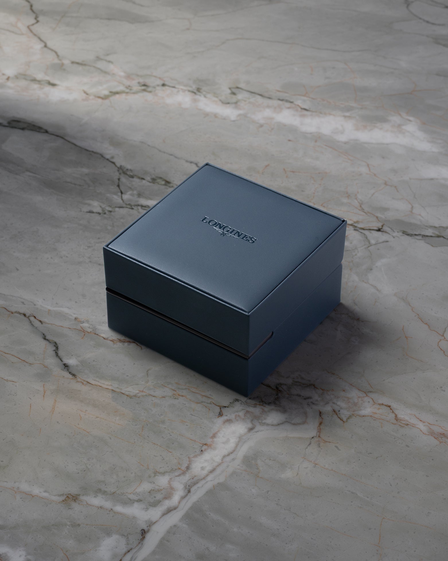 Classic blue Longines luxury watch presentation box on display