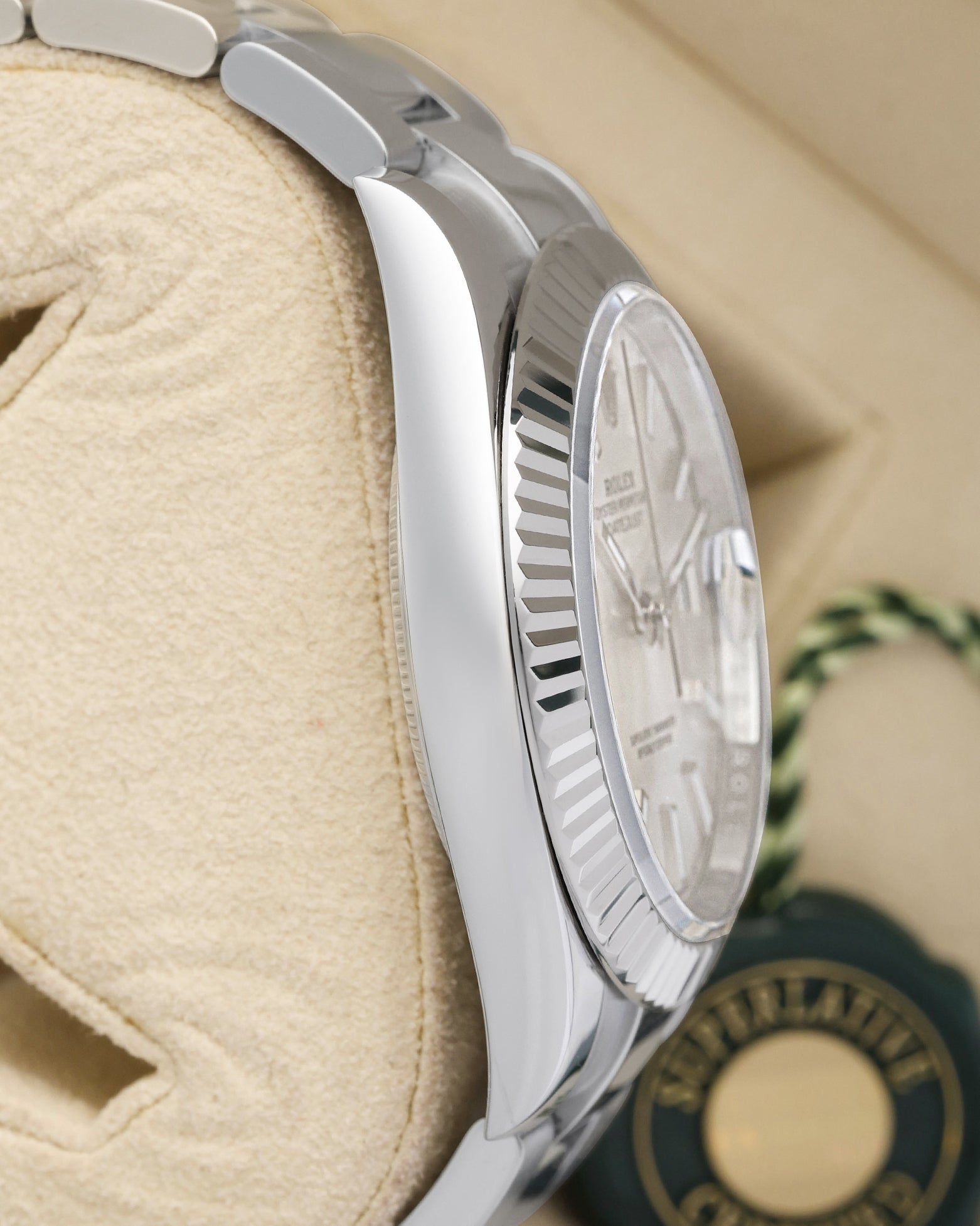 left side case profile of a 41mm Rolex Datejust showcasing the high-mirror finish of the corrosion-resistant 904L Oystersteel