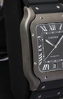 Left side perspective highlighting the ergonomic curved profile, square case shape, and distinctive exposed screws on the black ADLC bezel