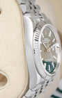 Side profile view of the polished 904L stainless steel Oyster case on the non-crown side of a Rolex Datejust 126234
