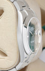 Side profile view of the polished 904L Oystersteel case on the non-crown side of a 41mm Rolex Datejust 126300 watch