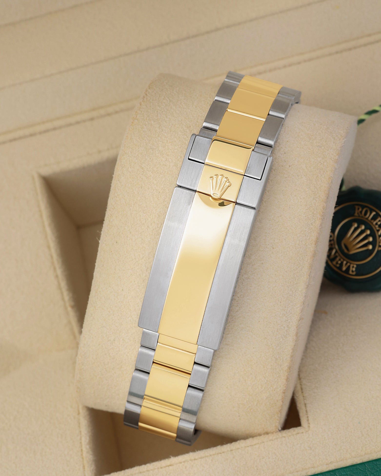 Two-tone 18k yellow gold and stainless steel Rolex Oyster bracelet featuring the folding Oysterlock safety clasp