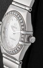 Right side profile view of the 26mm Omega Constellation 1465.71.00 showcasing the polished stainless steel case, diamond bezel detail, and winding crown.