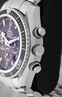 Side profile of 45.5mm stainless steel case showing Omega crown and chronograph pushers on Planet Ocean 2210.50.00