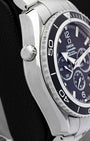 Side view showing the helium escape valve and thick steel case profile on Omega Seamaster Planet Ocean 600M