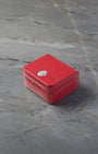 Iconic red Omega luxury watch presentation box included with pre-owned Planet Ocean 600M chronograph purchase