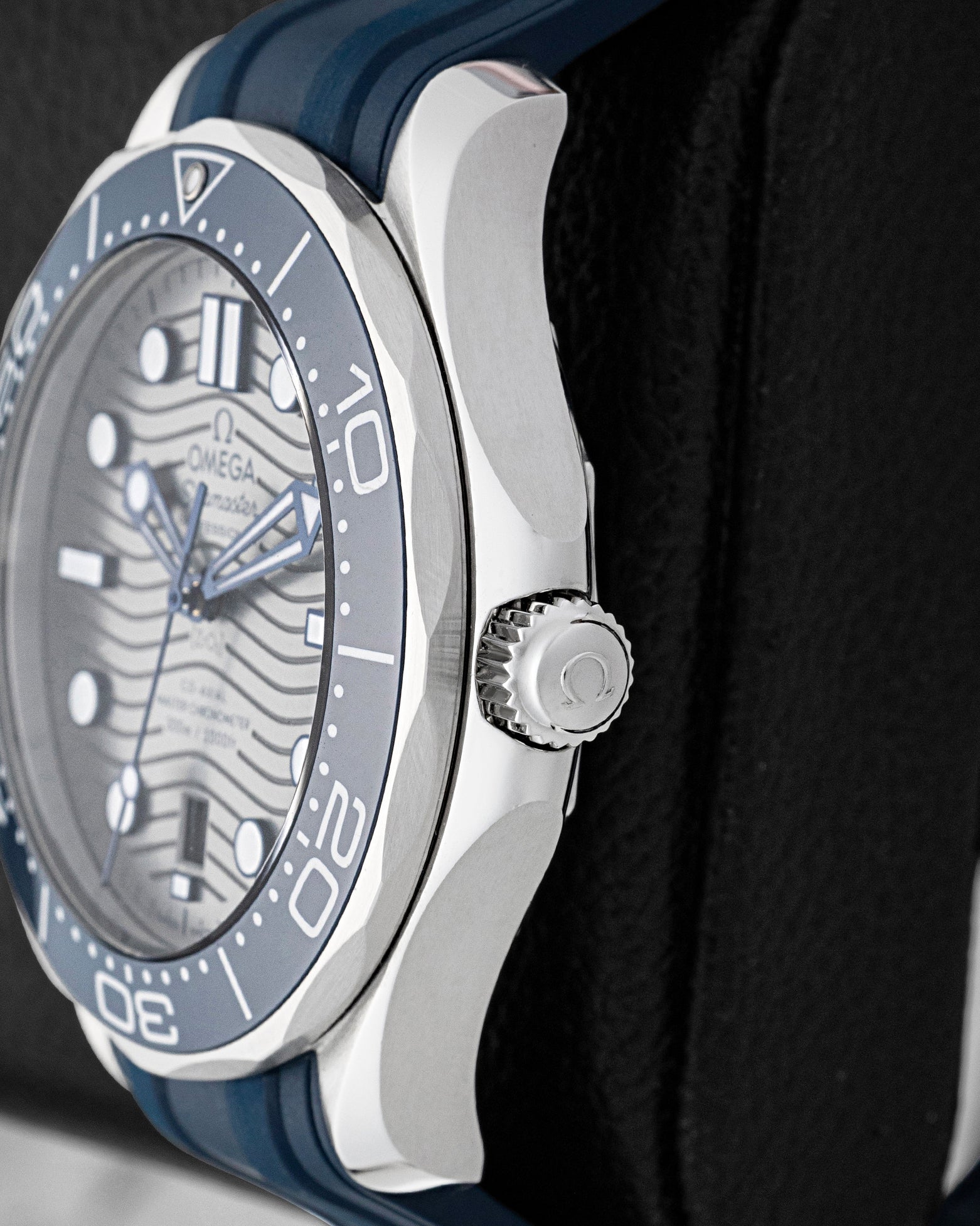 Side profile view of 42mm stainless steel case and conical helium escape valve on Omega Seamaster Diver 300M