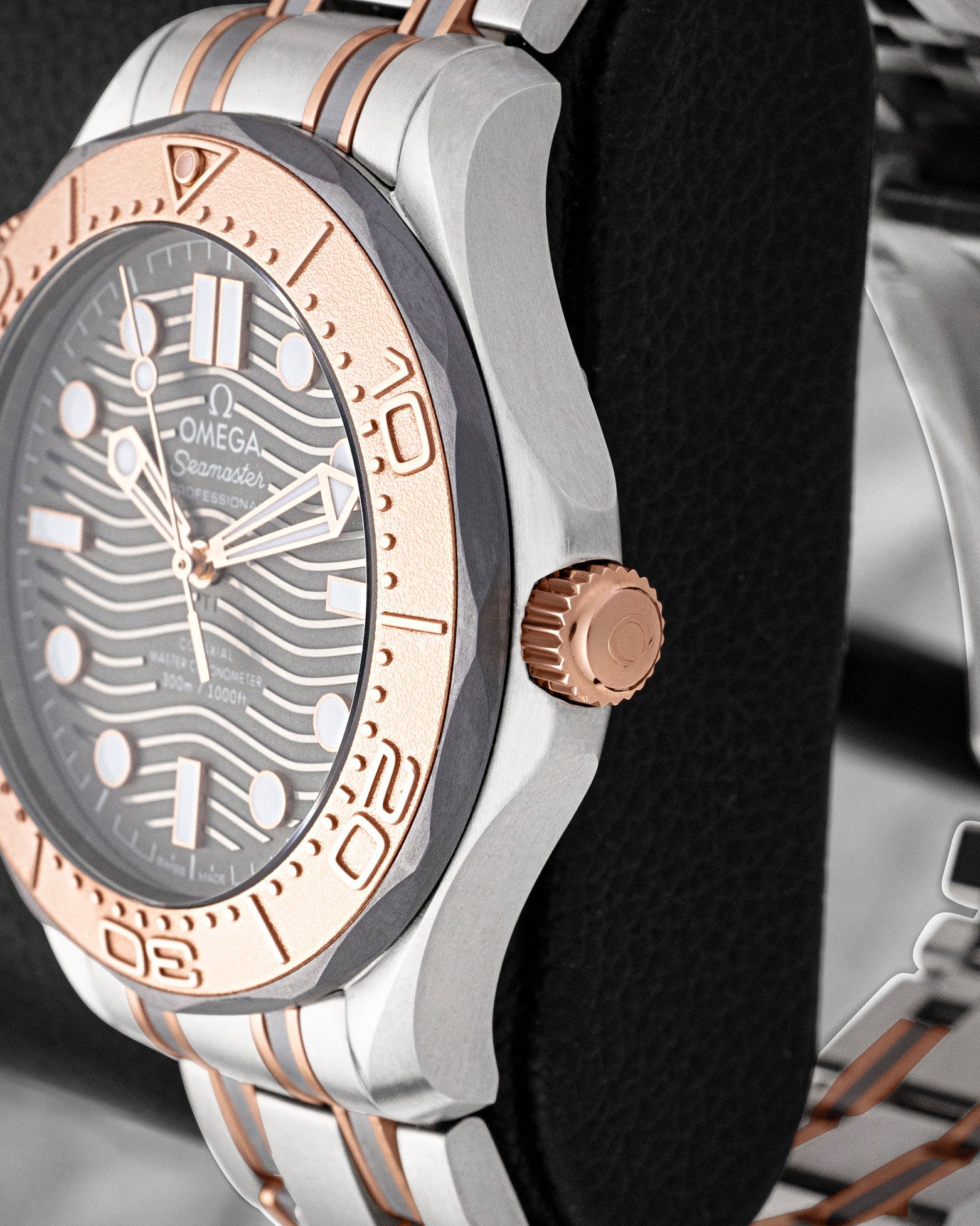Side profile of 42mm titanium case featuring 18k Sedna gold screw-down crown and tantalum bezel ring