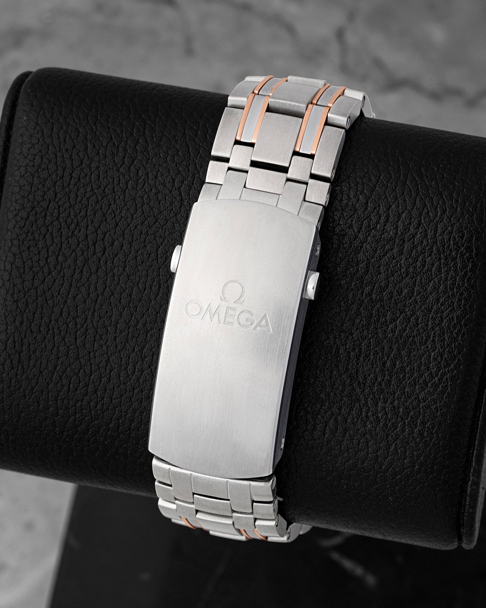 Titanium and tantalum bracelet with 18k Sedna gold link accents and folding diver clasp for Omega reference 210.60.42.20.99.001