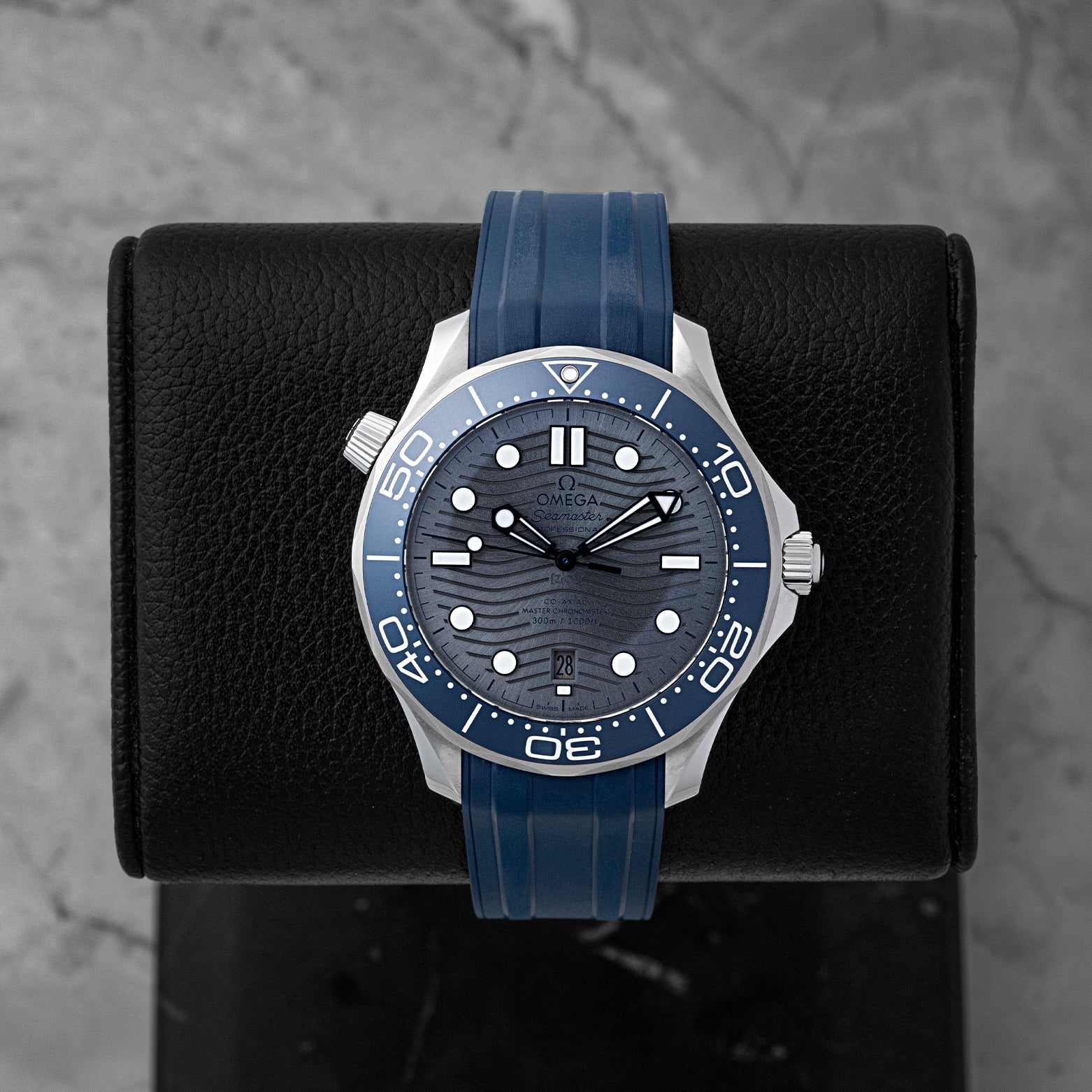 Pre-owned 2025 Omega Seamaster Diver 300M 210.32.42.20.06.001 grey wave dial on blue rubber strap at Noah's Fine Watches Dallas