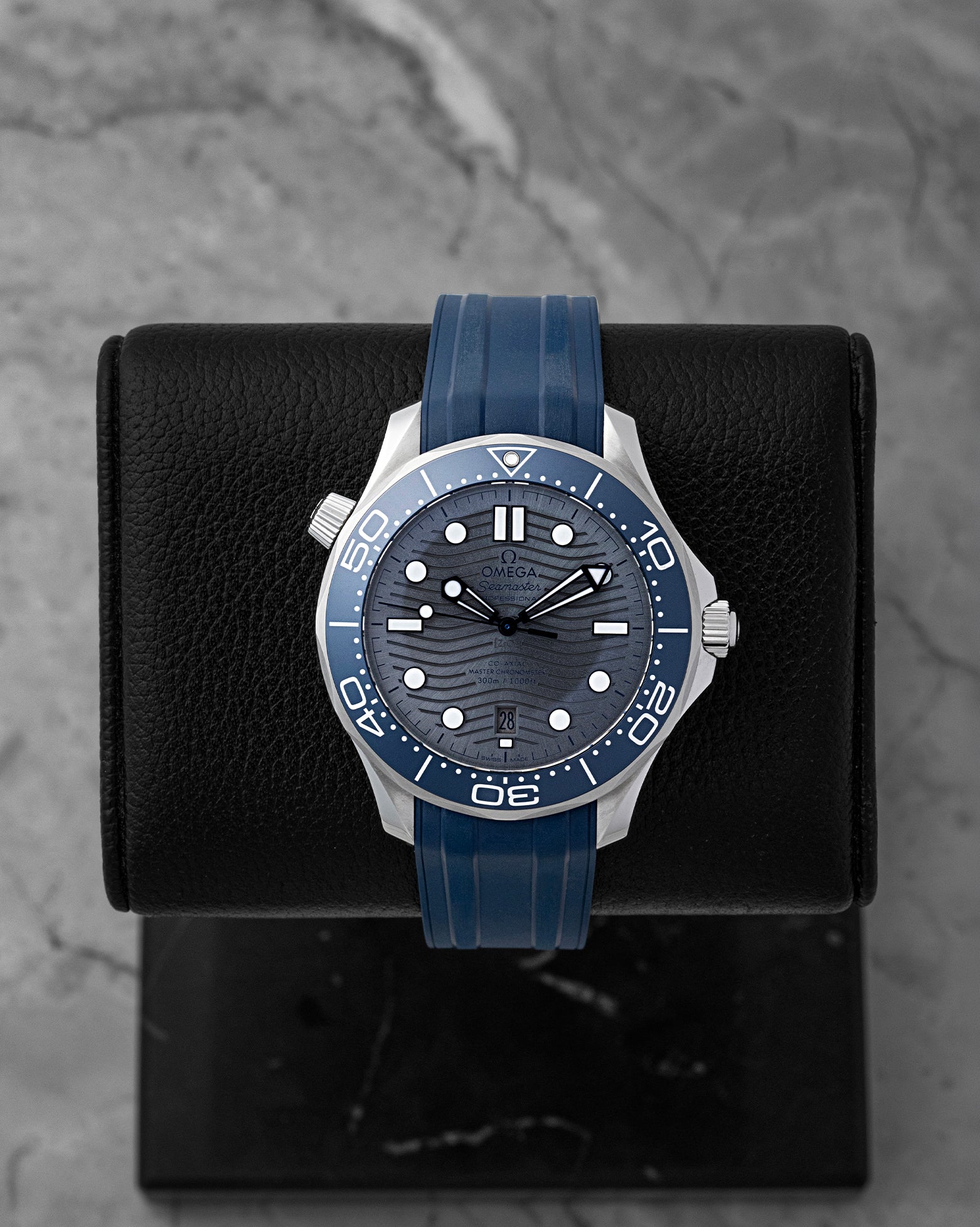 Pre-owned 2025 Omega Seamaster Diver 300M 210.32.42.20.06.001 grey wave dial on blue rubber strap at Noah's Fine Watches Dallas