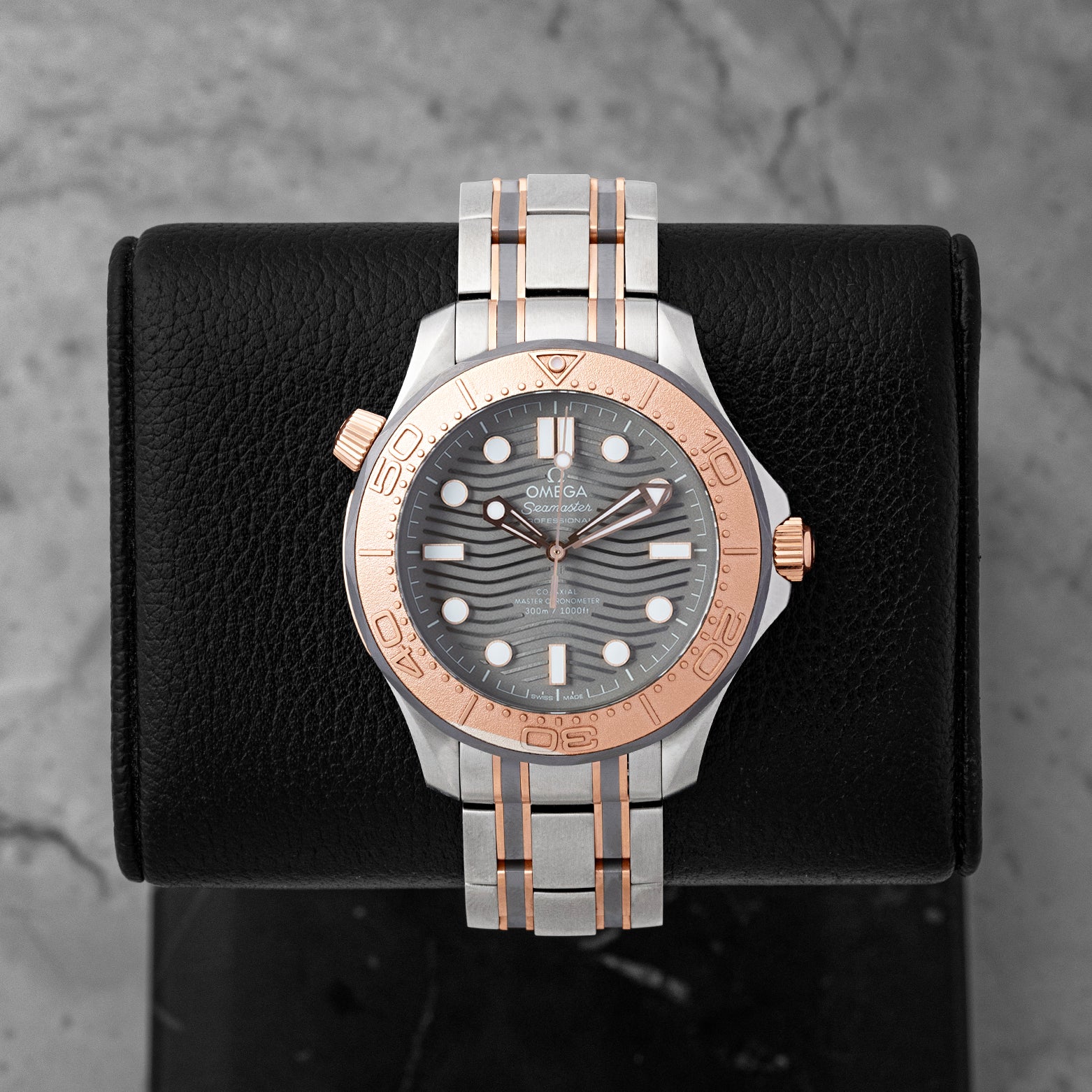 Pre-owned 2019 Omega Seamaster Diver 300M 210.60.42.20.99.001 titanium tantalum and Sedna gold watch at Noah's Fine Watches Dallas