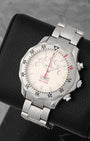 A high-angle three-quarter studio portrait of the 41.5mm Omega Seamaster Apnea case showcasing its distinct unidirectional rotating bezel with a red 10-minute scale segment