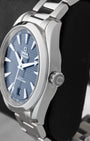 Right side profile view of the 2022 Omega Seamaster Aqua Terra 150M stainless steel case, smooth bezel, and conical winding crown.