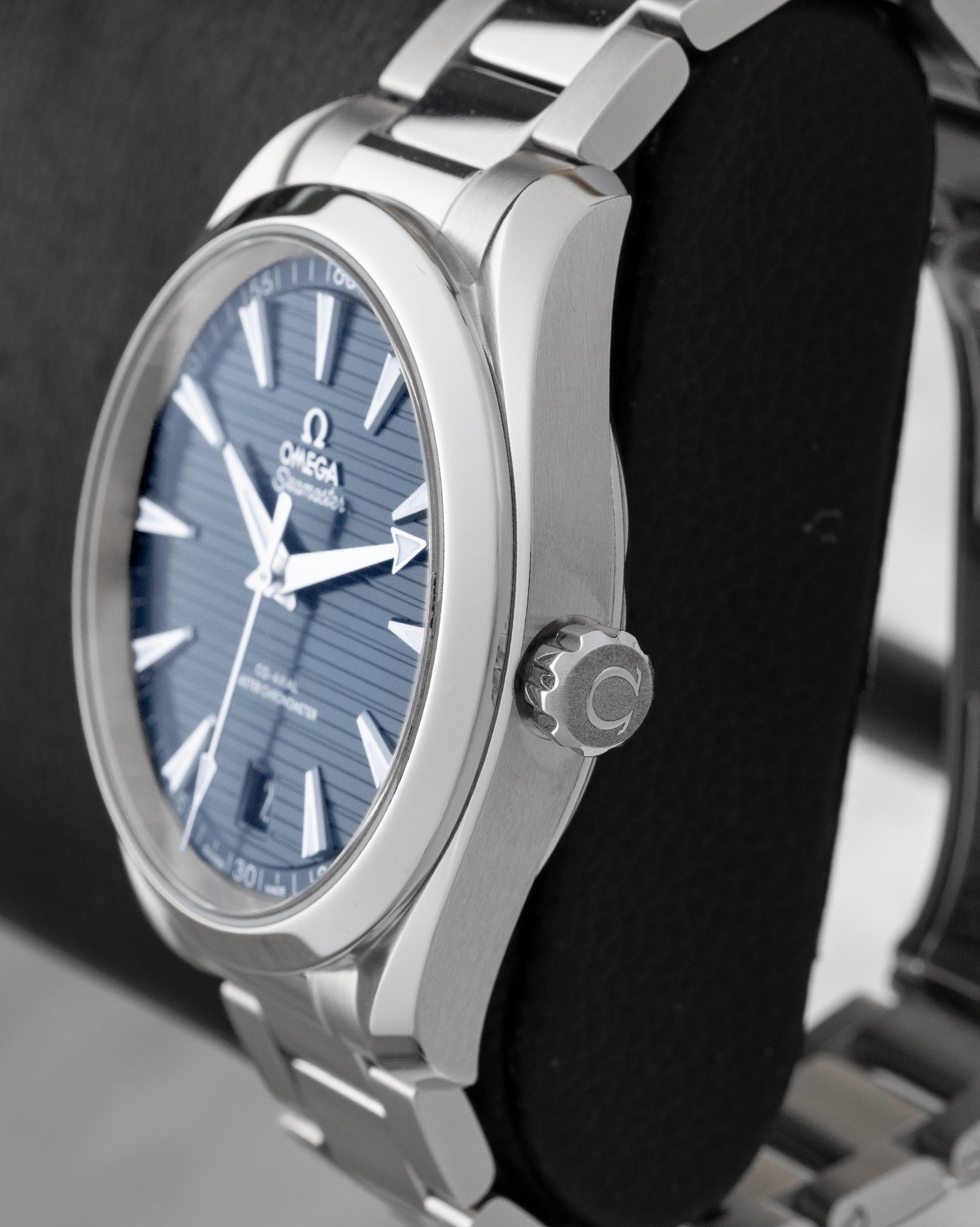 Right side profile view of the 2022 Omega Seamaster Aqua Terra 150M stainless steel case, smooth bezel, and conical winding crown.