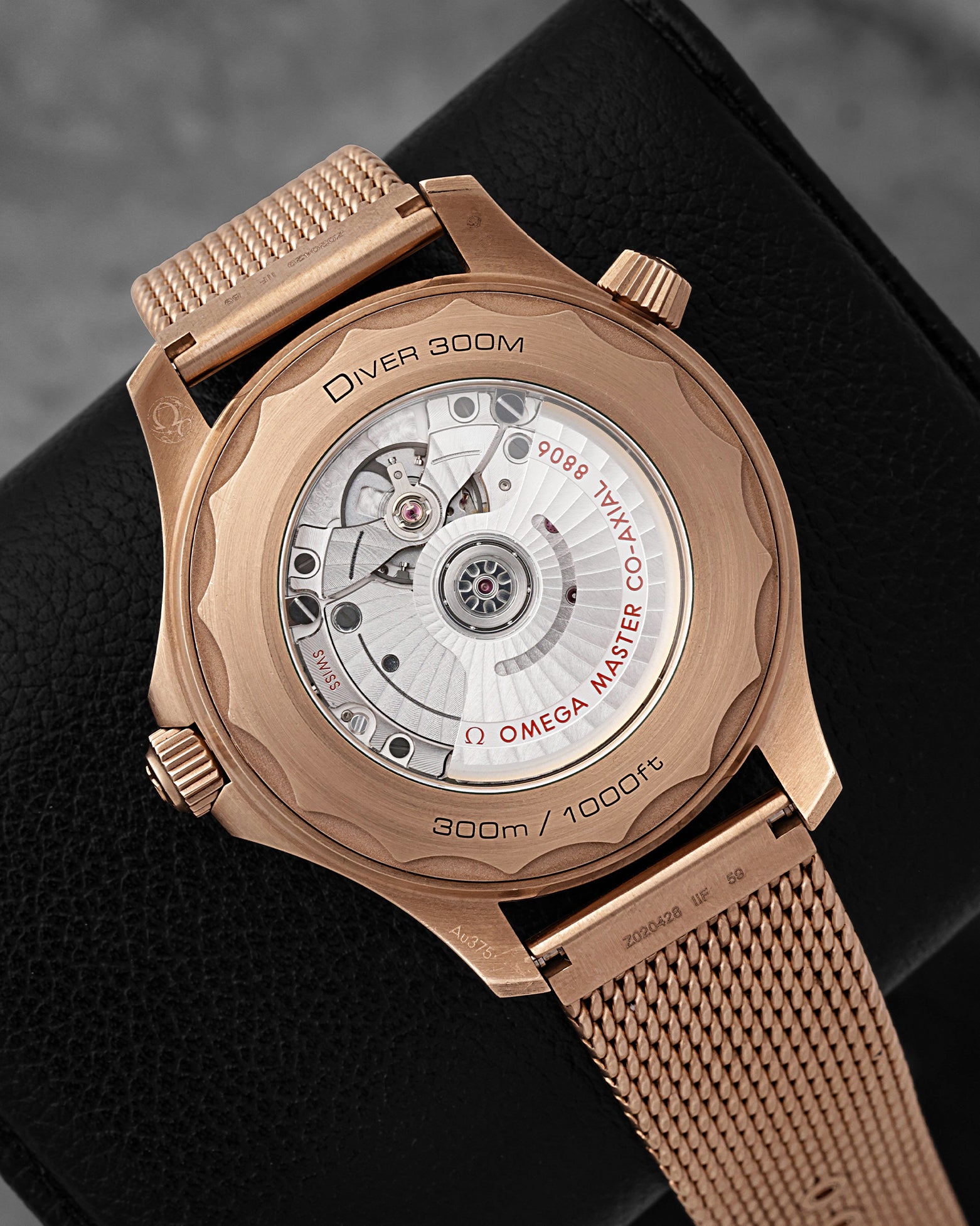 Transparent sapphire caseback displaying the Calibre 8806 movement on an Omega Seamaster Diver 300M