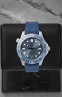 Omega Seamaster Diver 300M Co-Axial Master Chronometer 42mm watch with a grey wave dial and blue rubber strap, model 210.32.42.20.06.001, on display at Noah's Fine Watches & Jewelry in Dallas
